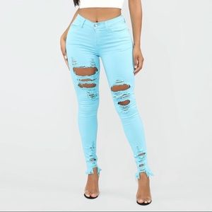 Turquoise distressed skinny jeans size 11